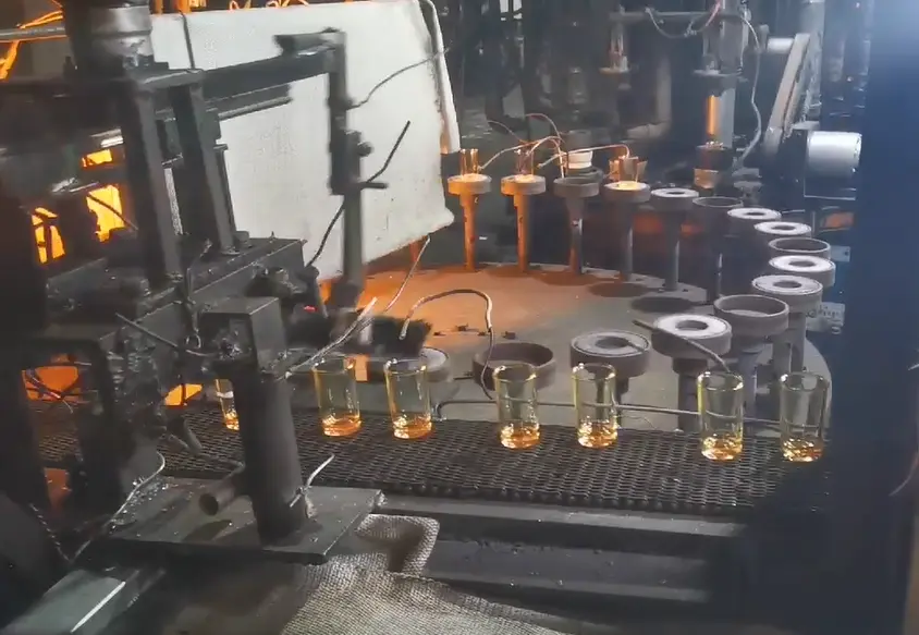 Glass forming line for candle jar production