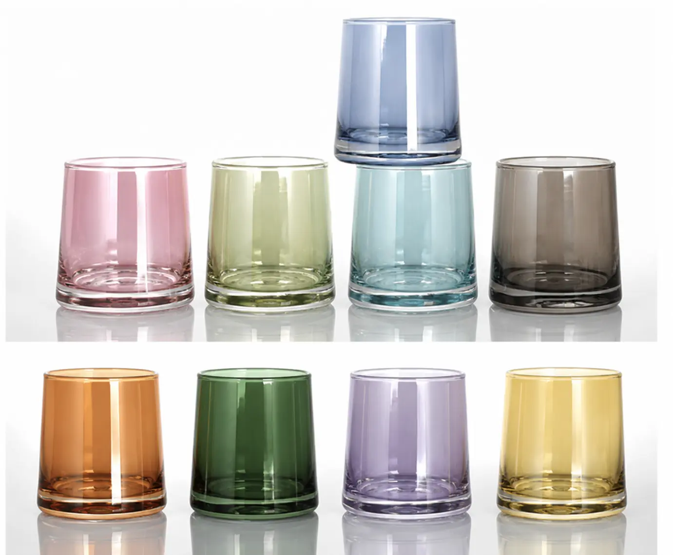 Colored glass candle jars in different transparent colors for custom candle collections