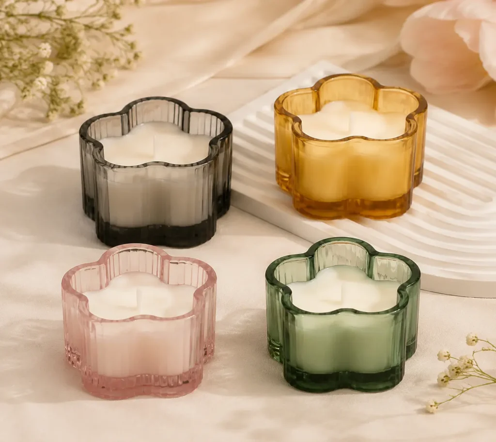 Colorful flower-shaped ribbed glass candle jars for home fragrance collections